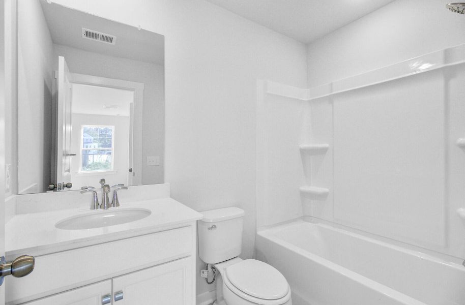 Furnished interior view inside a new home in Indigo Grove Townhomes, Johns Island (Image 11).