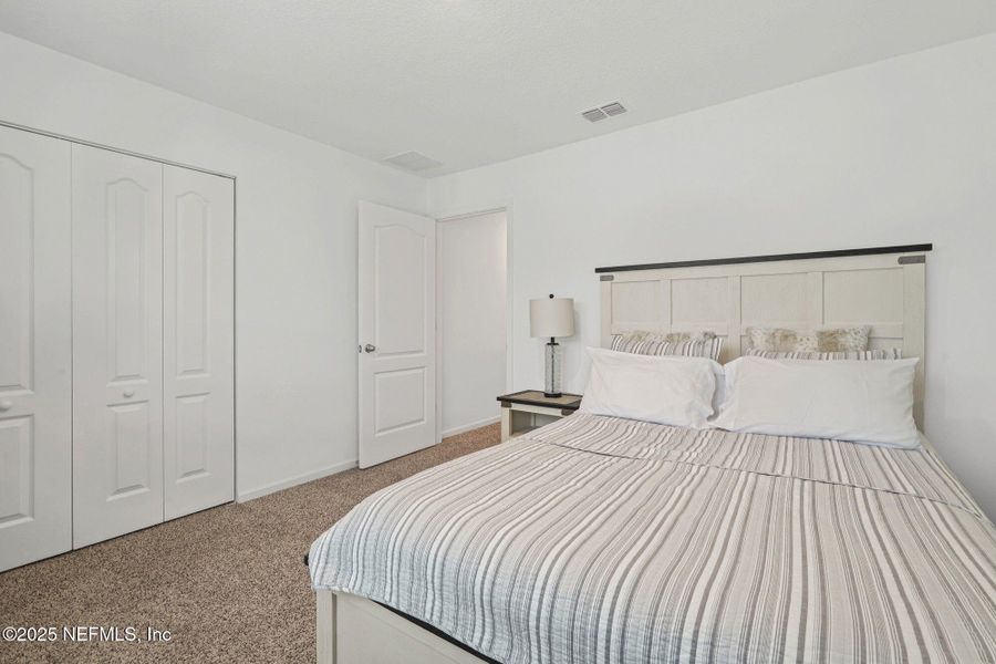 Furnished interior view inside a new home in Entrada, St. Augustine (Image 44).