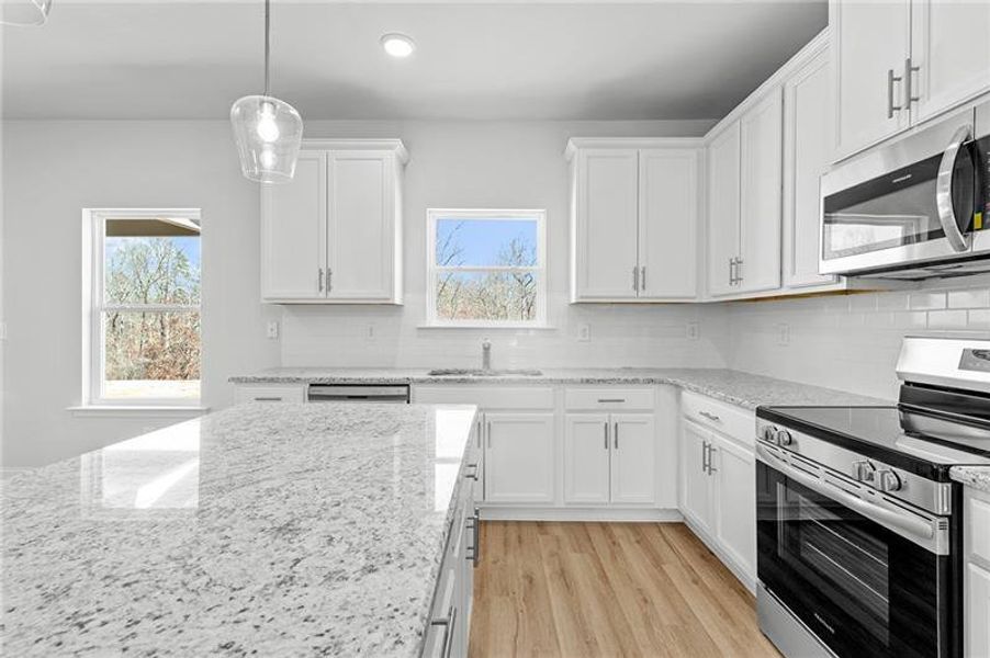 Furnished interior view inside a new home in , Homer (Image 9). Furnished interior view inside a new home in , Homer (Image 9).