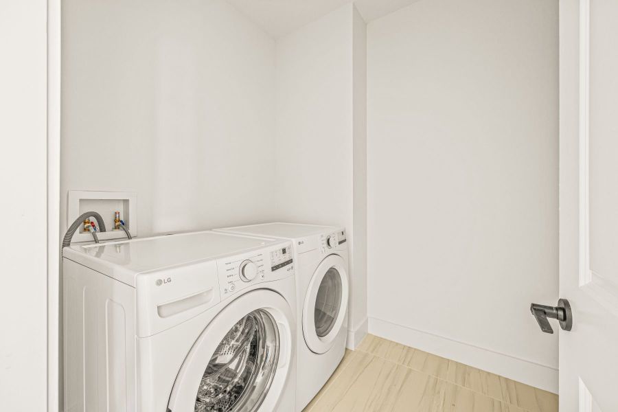 Representative furnished interior of a home built from the Model 1 M-2 by Onx Homes in On Villa Pass, Mascotte (Image 26).