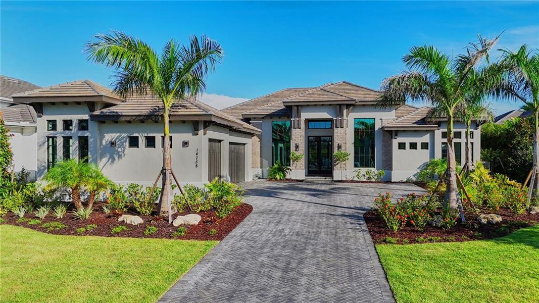 Front exterior of a new home in , Bradenton, FL, highlighting curb appeal (Image 25).