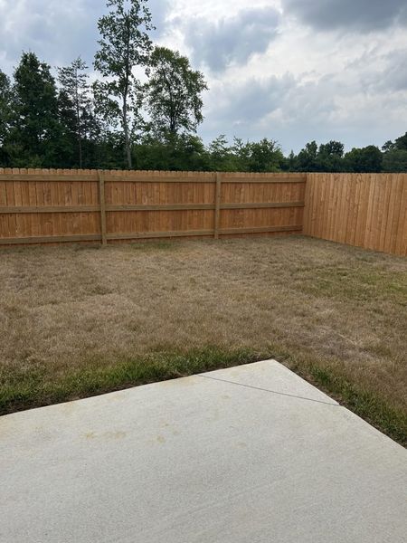 Exterior details and patio area of a home in The Wilcox, Greensboro (Image 24).