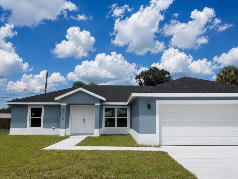 Front exterior of a new home in , Vero Beach, FL, highlighting curb appeal (Image 2). Front exterior of a new home in , Vero Beach, FL, highlighting curb appeal (Image 2).