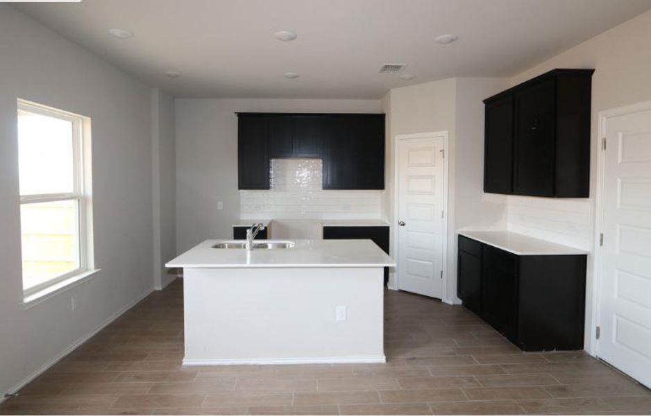 Furnished interior view inside a new home in Cascades at Onion Creek, Austin (Image 12). Furnished interior view inside a new home in Cascades at Onion Creek, Austin (Image 12).