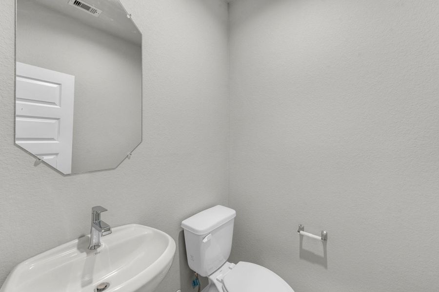 Furnished interior view inside a new home in Barton Creek Ranch, Conroe (Image 11).