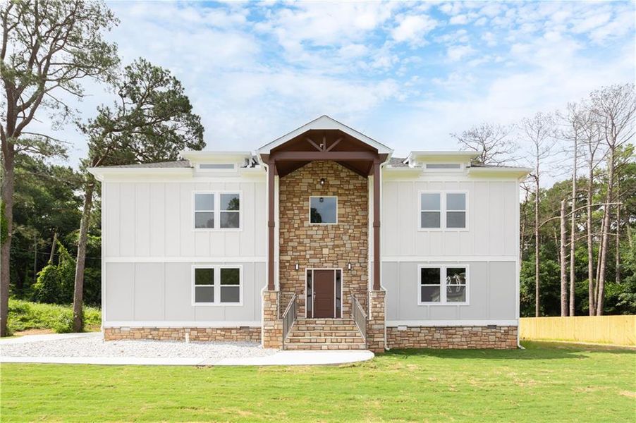 Front exterior of a new home in , Decatur, GA, highlighting curb appeal (Image 1).