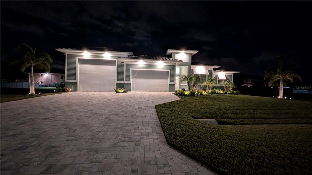 Front exterior of a new home in , Cape Coral, FL, highlighting curb appeal (Image 29).