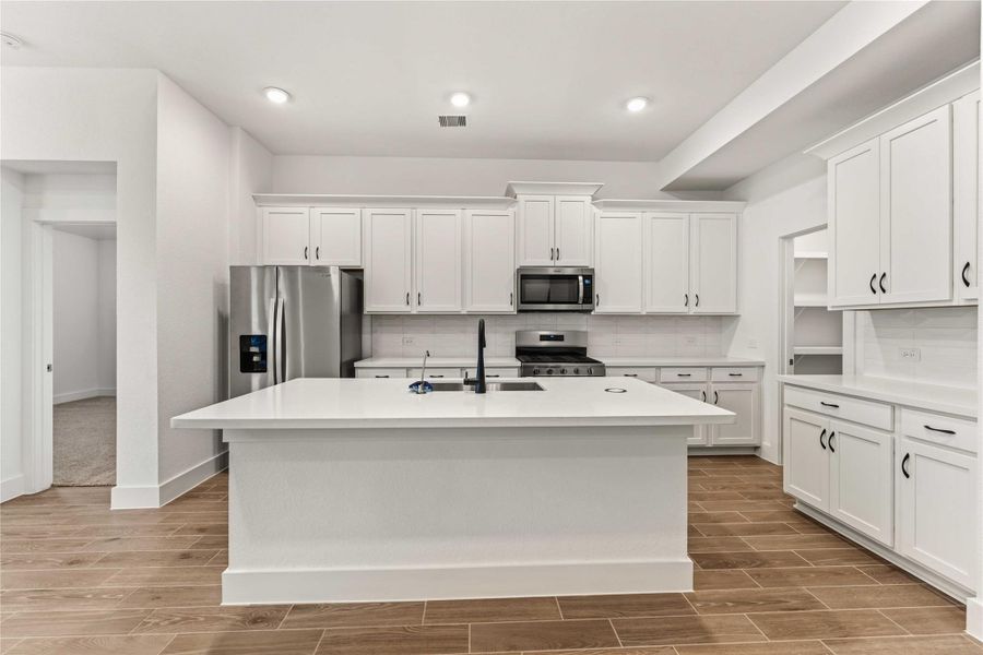 Furnished interior view inside a new home in Sunterra, Katy (Image 10). Furnished interior view inside a new home in Sunterra, Katy (Image 10).