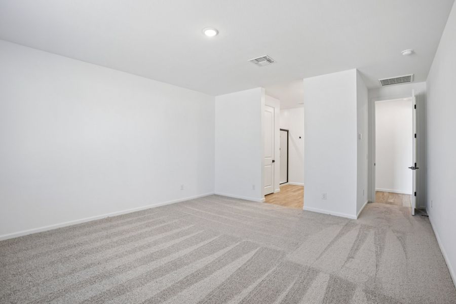 Primary suite - Sanctuary at Stonebridge Model Home. Finishes and options may vary by community