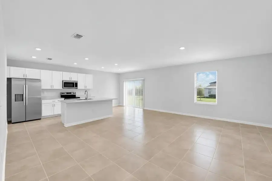 Representative unfurnished interior of a home built from the Dove by Taylor Morrison in Azure at Solaeris, Port St. Lucie (Image 24).