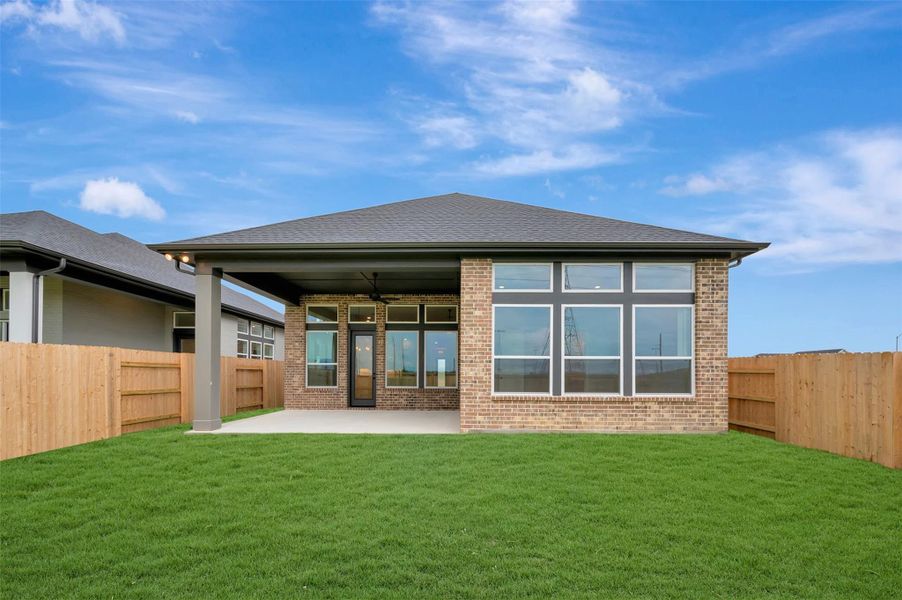 Exterior details and patio area of a home in Elyson - Reserve Collection, Katy (Image 21).
