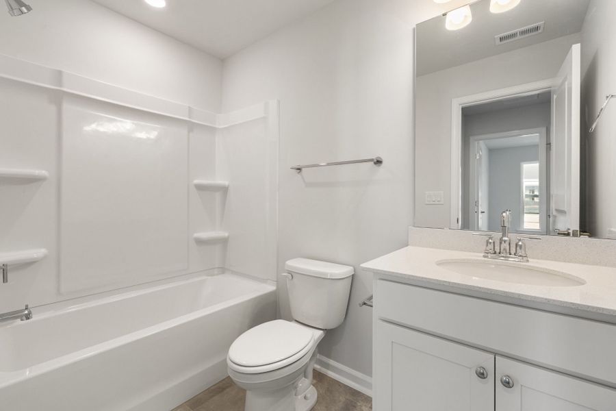 Furnished interior view inside a new home in Poets Walk, Whitsett (Image 5).