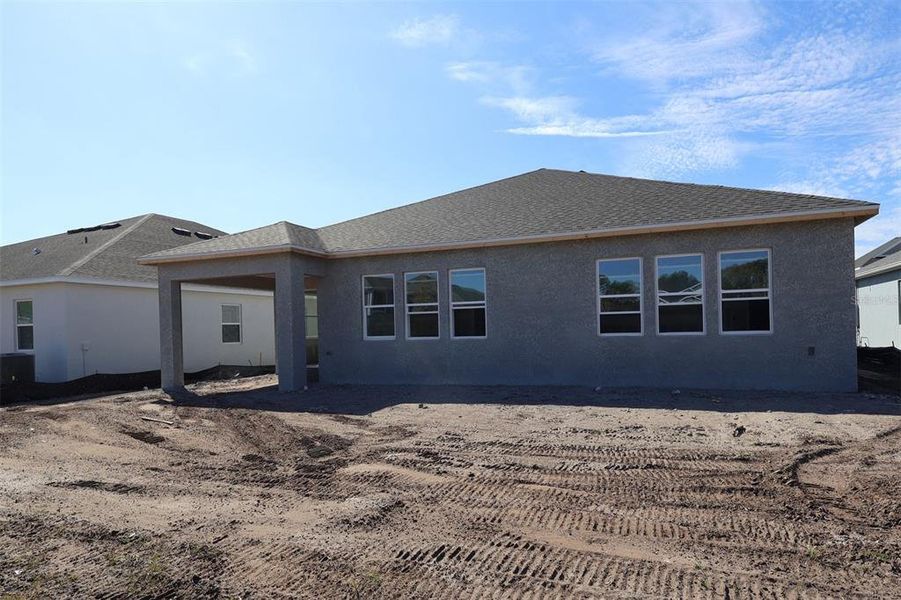 Exterior details and patio area of a home in Ravencliffe, Oviedo (Image 3).