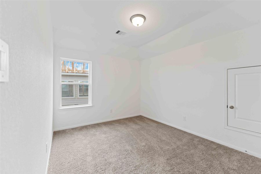 Spacious, unfurnished interior of a new home in Sunterra, Katy (Image 19).