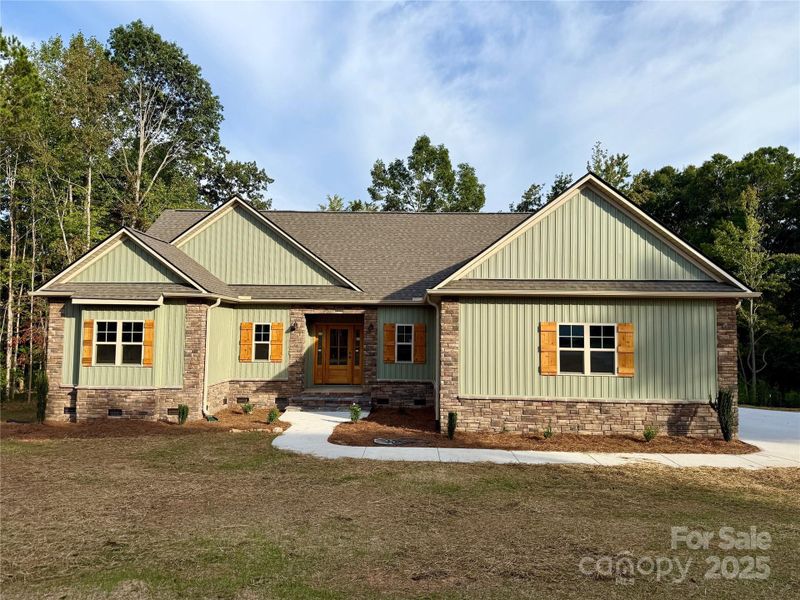Front exterior of a new home in , Denton, NC, highlighting curb appeal (Image 15). Front exterior of a new home in , Denton, NC, highlighting curb appeal (Image 15).
