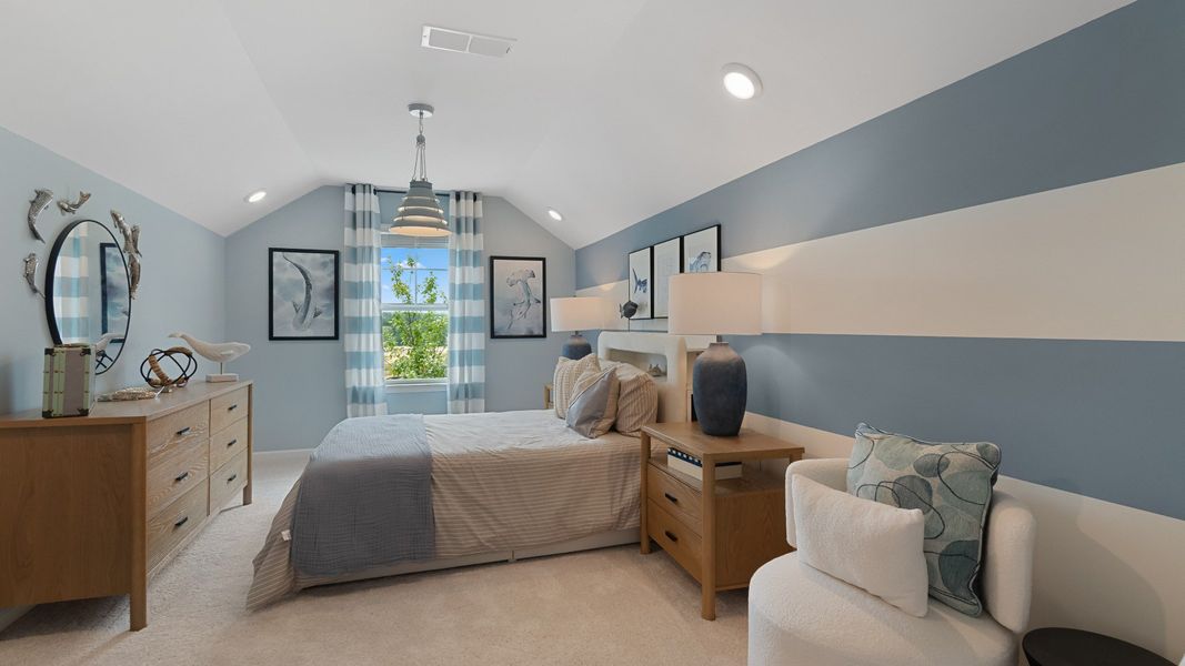 Spacious bonus room featuring high ceilings and bright windows, ideal for media, playroom, or guest room.