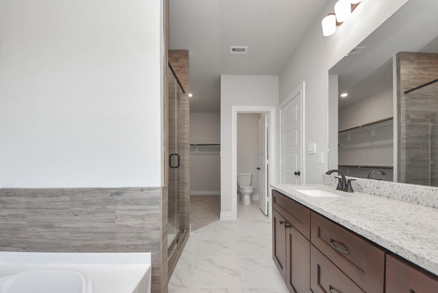 Furnished interior view inside a new home in Hill & Dale Ranch, Splendora (Image 5).