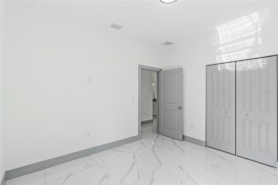 Spacious, unfurnished interior of a new home in , Port Charlotte (Image 20).
