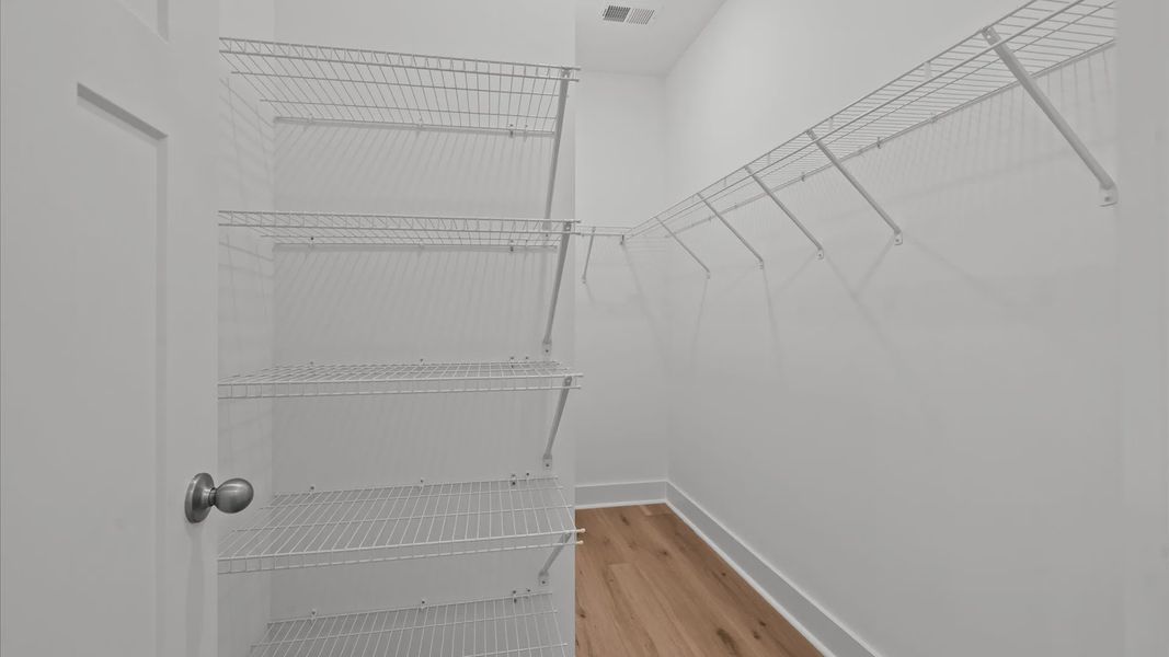 Furnished interior view inside a new home in Pelham Crossing Villas, Greenville (Image 21).