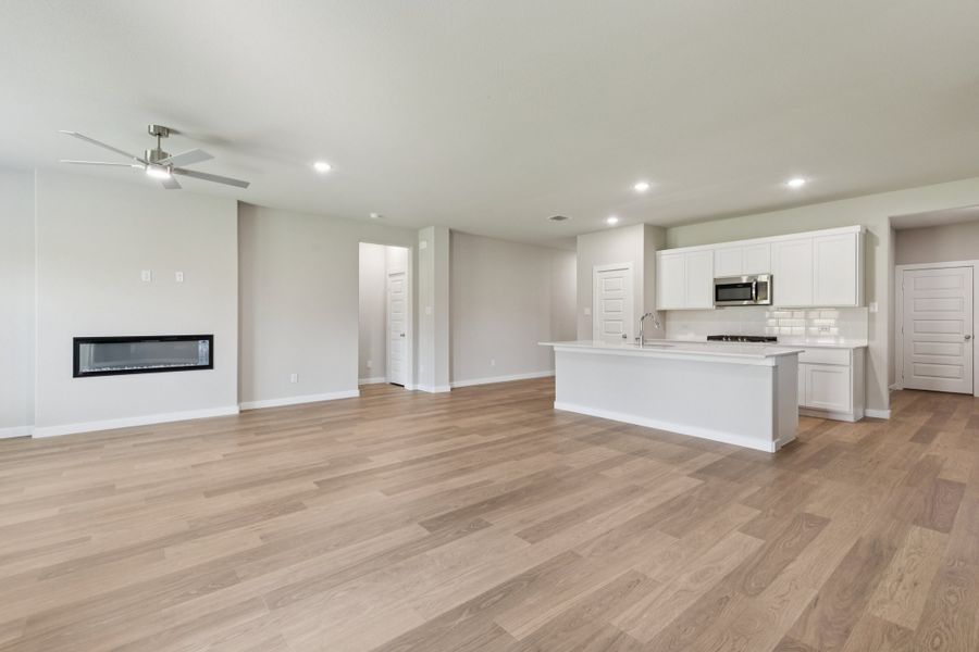 Open Floorplan in the Heisman home plan by Trophy Signature Homes – REPRESENTATIVE PHOTO