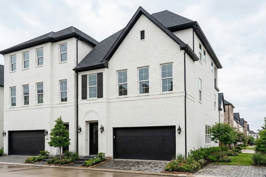 Front exterior of a new home in Cottage Grove Lake Phase 2, Houston, TX, highlighting curb appeal (Image 1). Front exterior of a new home in Cottage Grove Lake Phase 2, Houston, TX, highlighting curb appeal (Image 1).