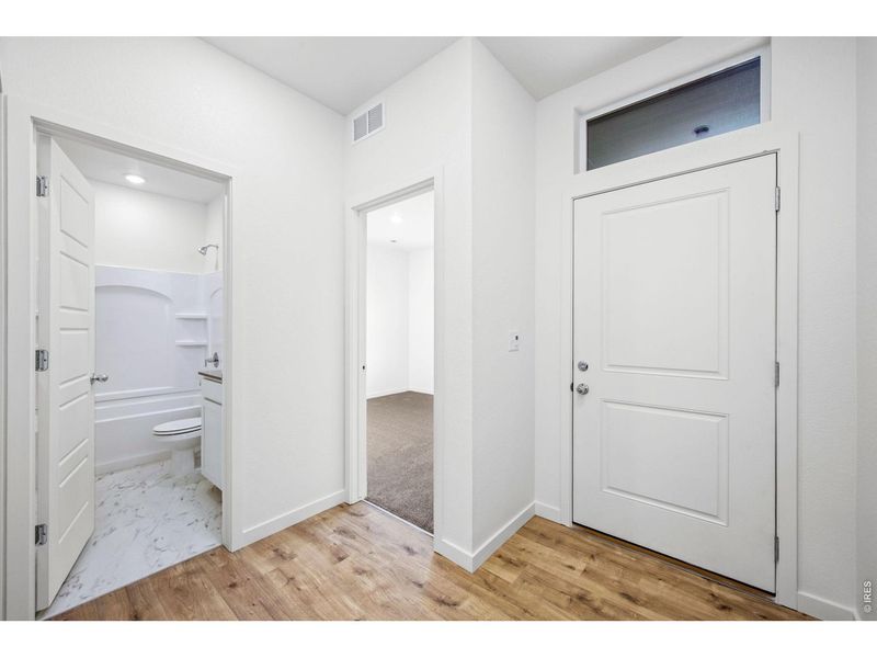 Spacious, unfurnished interior of a new home in Union Colony West, Greeley (Image 10).
