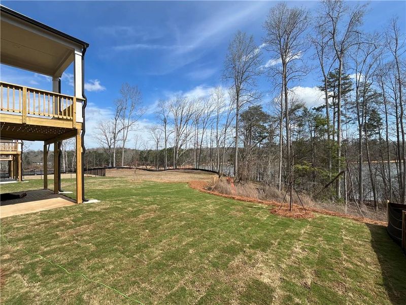 Exterior details and patio area of a home in East Harbor II at Chestatee, Dawsonville (Image 18).