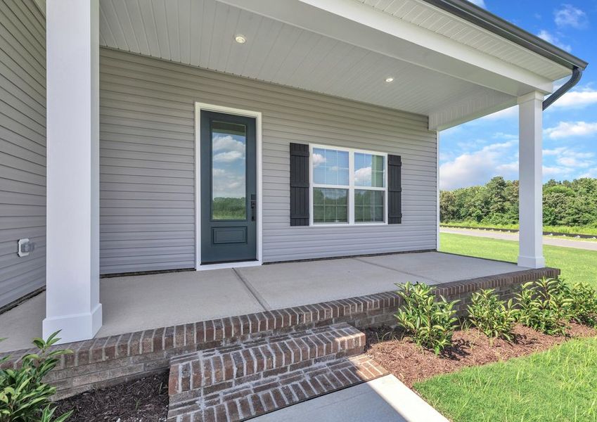 The front porch is the perfect place to enjoy a cup of coffee.