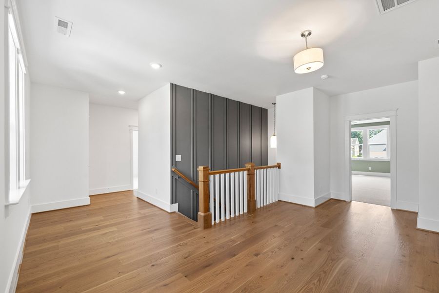 Representative unfurnished interior of a home built from the The Emerson by RobuckHomes in Stonehenge, Raleigh (Image 188).