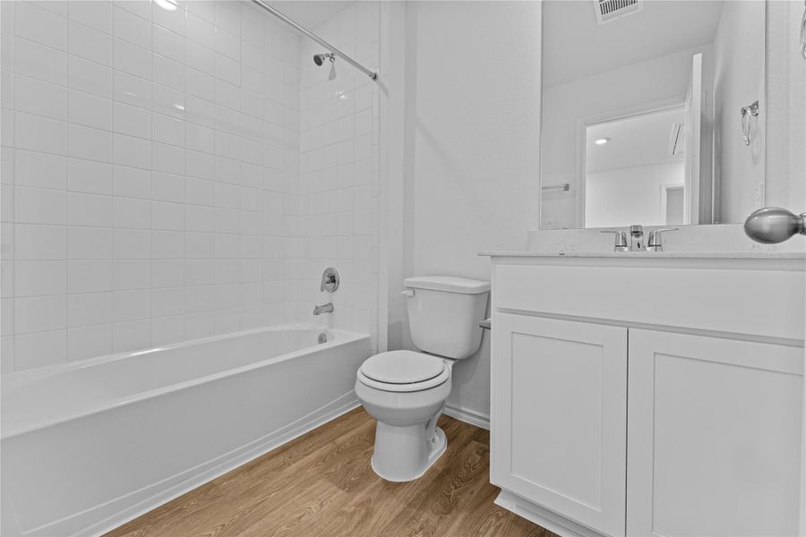 Furnished interior view inside a new home in Prairie Lakes, Buda (Image 6).