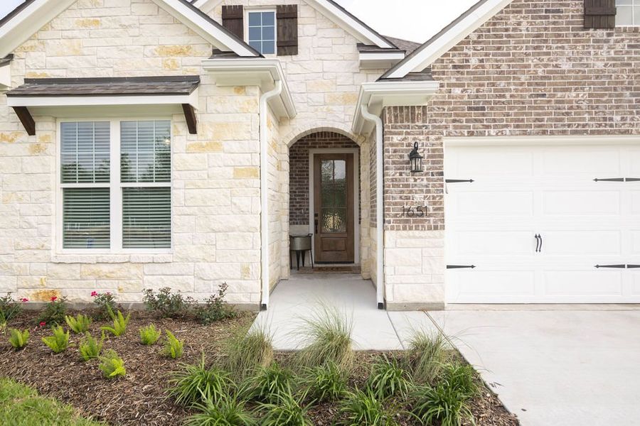 Representative exterior photo of a completed home built from the The Laurel by Avonley Homes in Greens Prairie Reserve, College Station, TX (Image 2).