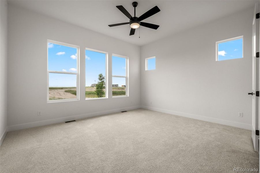 Spacious, unfurnished interior of a new home in Wolf Ranch - Enclave Collection, Colorado Springs (Image 30).