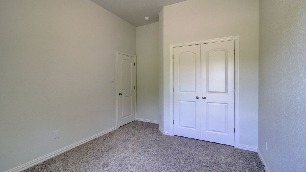 Furnished interior view inside a new home in The Crossvine, Schertz (Image 18).