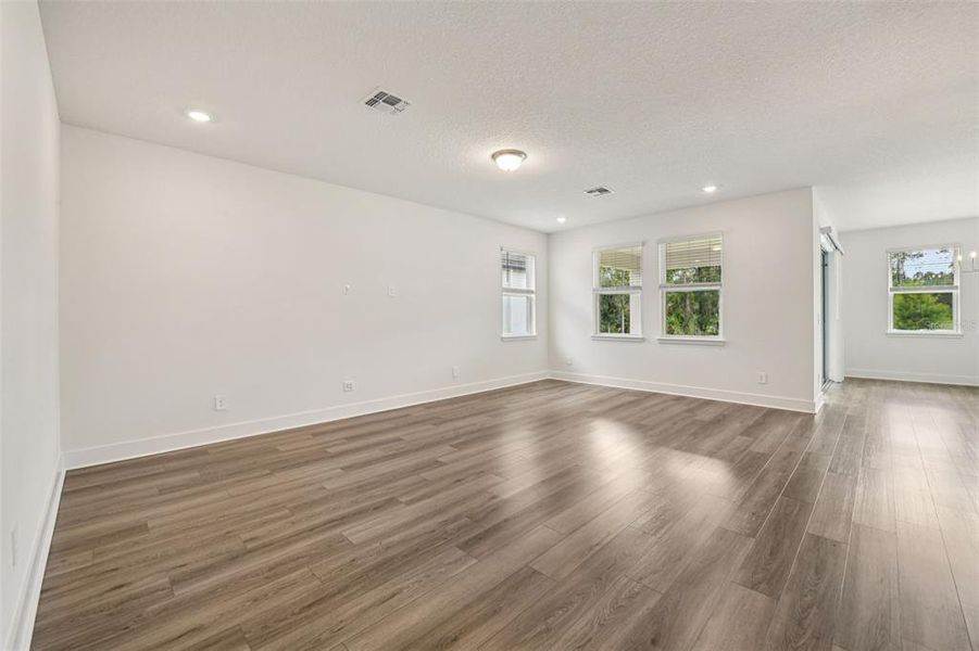 Spacious, unfurnished interior of a new home in Legends Preserve - Signature Series, Daytona Beach (Image 14).