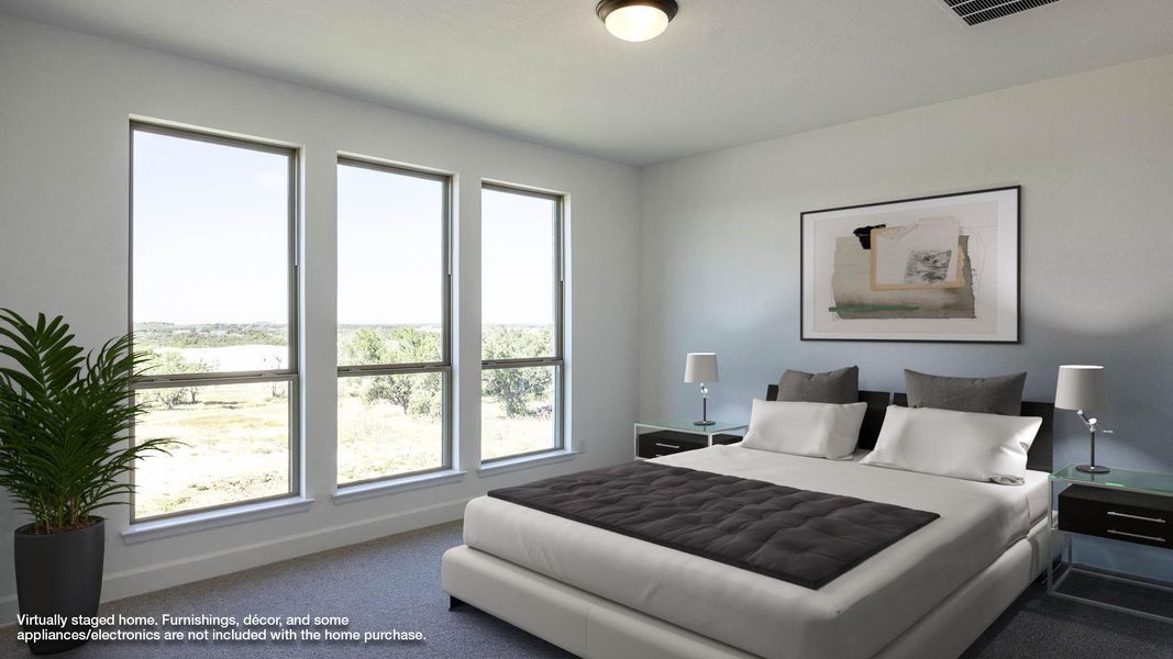 Bedroom with carpet floors and baseboards