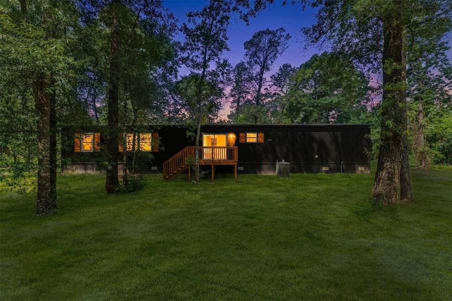 Exterior details and patio area of a home in , Conroe (Image 22).