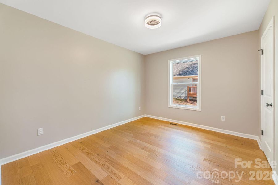 Spacious, unfurnished interior of a new home in , Waynesville (Image 30).