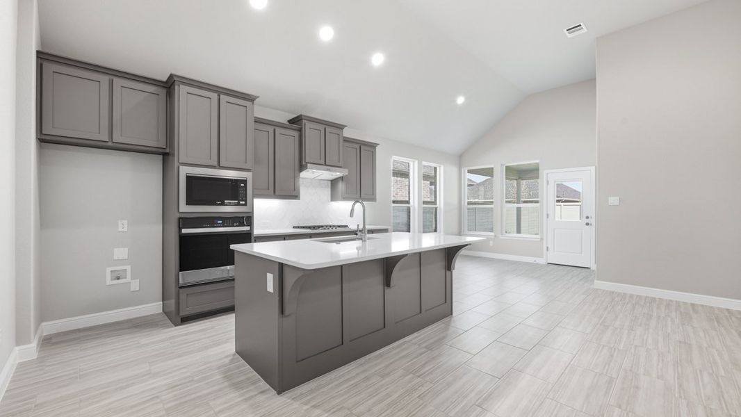 Representative furnished interior of a home built from the BASSWOOD by D.R. Horton in Treeline, Justin (Image 9).