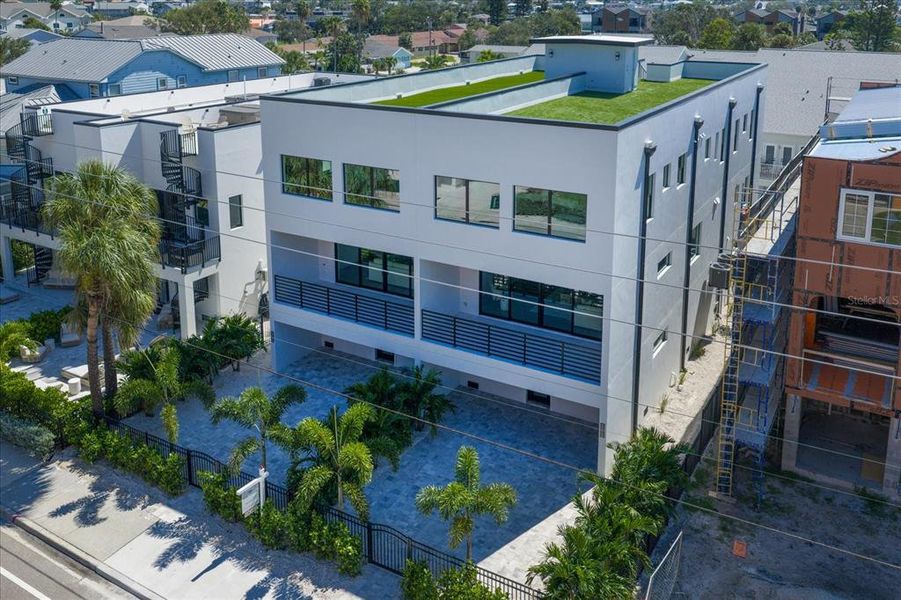 Front exterior of a new home in , Indian Rocks Beach, FL, highlighting curb appeal (Image 1). Front exterior of a new home in , Indian Rocks Beach, FL, highlighting curb appeal (Image 1).