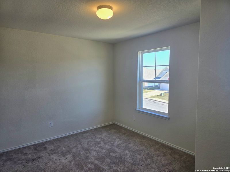 Spacious, unfurnished interior of a new home in Davis Ranch, San Antonio (Image 9).
