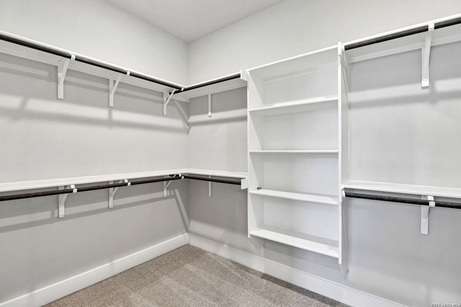 Spacious, unfurnished interior of a new home in Estancia Ranch - Premier Series, San Antonio (Image 35).