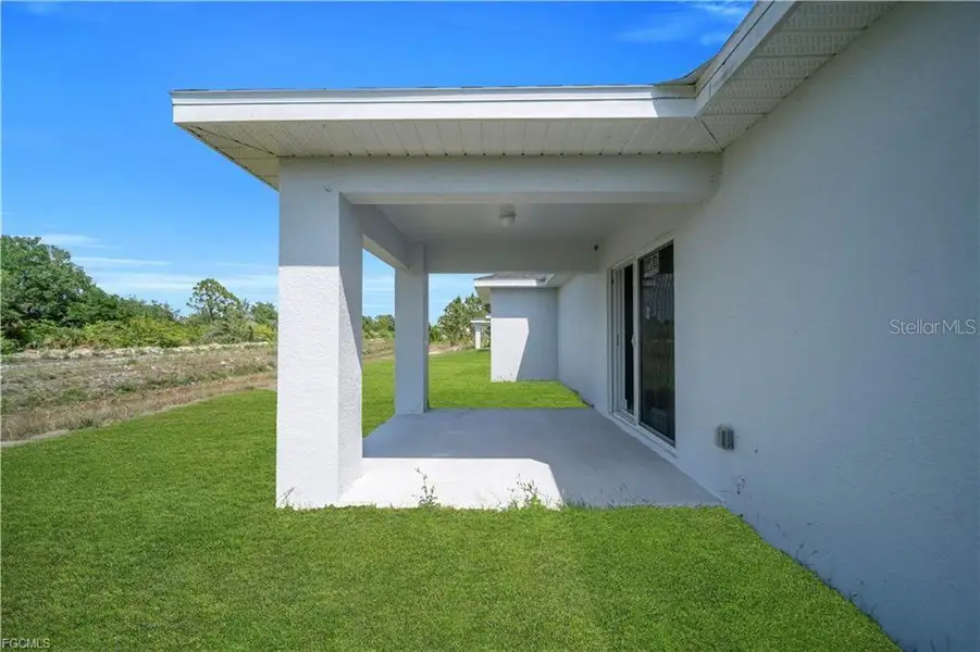 Exterior details and patio area of a home in , Lehigh Acres (Image 4).