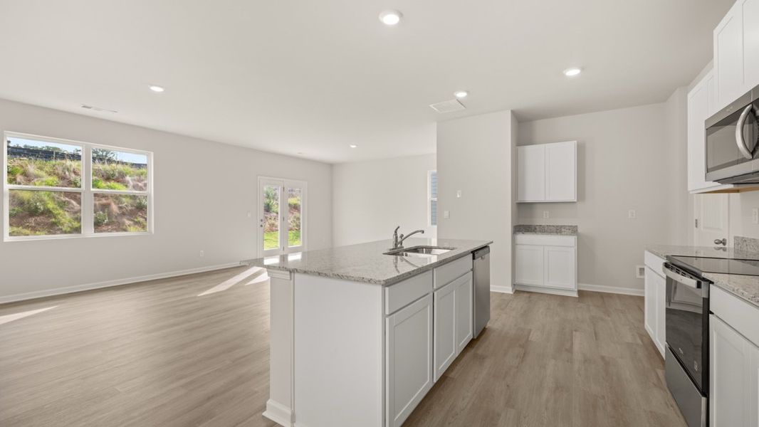 Representative furnished interior of a home built from the ELSTON by D.R. Horton in Pointe Park, Union City (Image 7).