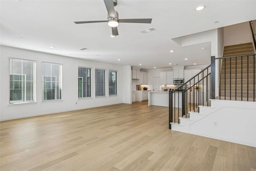 Featuring walls of windows throughout the main floor, this beautiful home is filled with natural light.