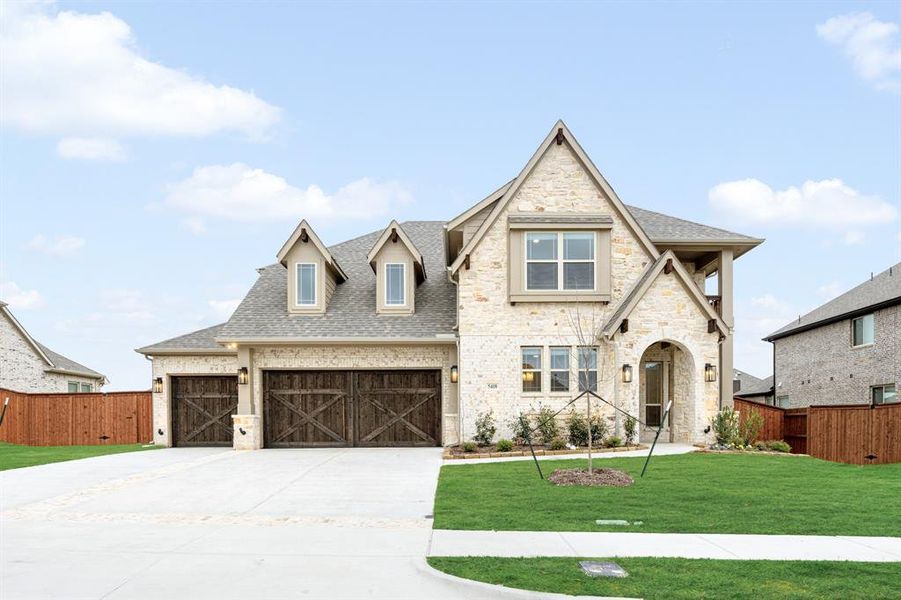Front exterior of a new home in Hayes Crossing, Midlothian, TX, highlighting curb appeal (Image 1). Front exterior of a new home in Hayes Crossing, Midlothian, TX, highlighting curb appeal (Image 1).