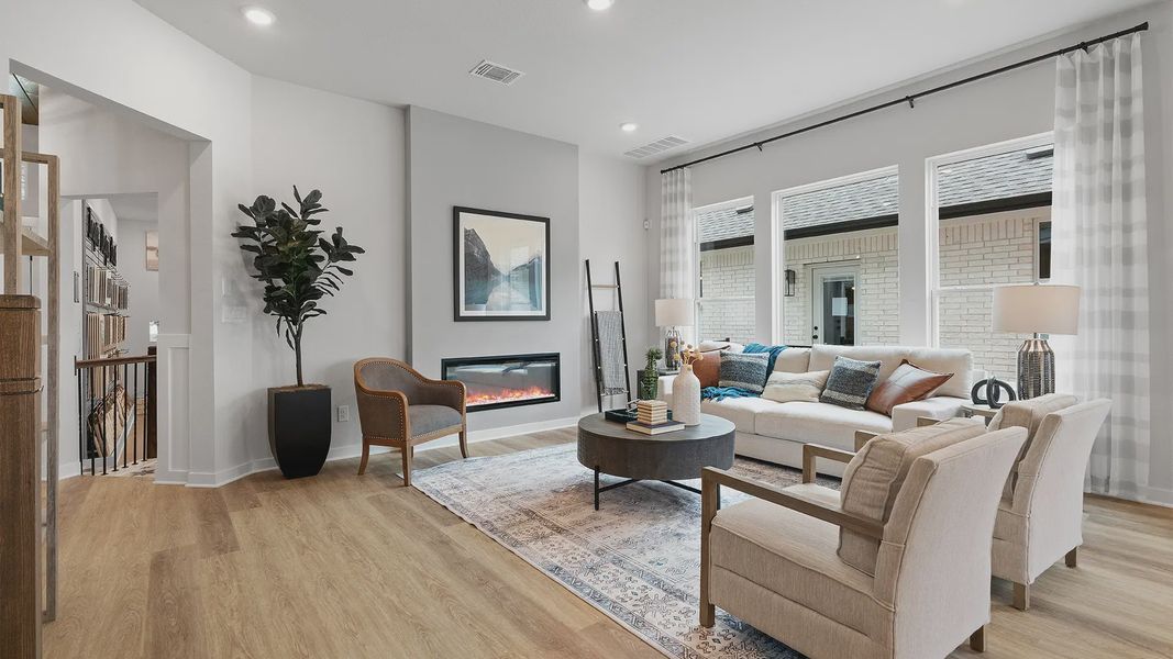 Representative furnished interior of a home built from the Wilson by Chesmar Homes in Lariat, Liberty Hill (Image 7).