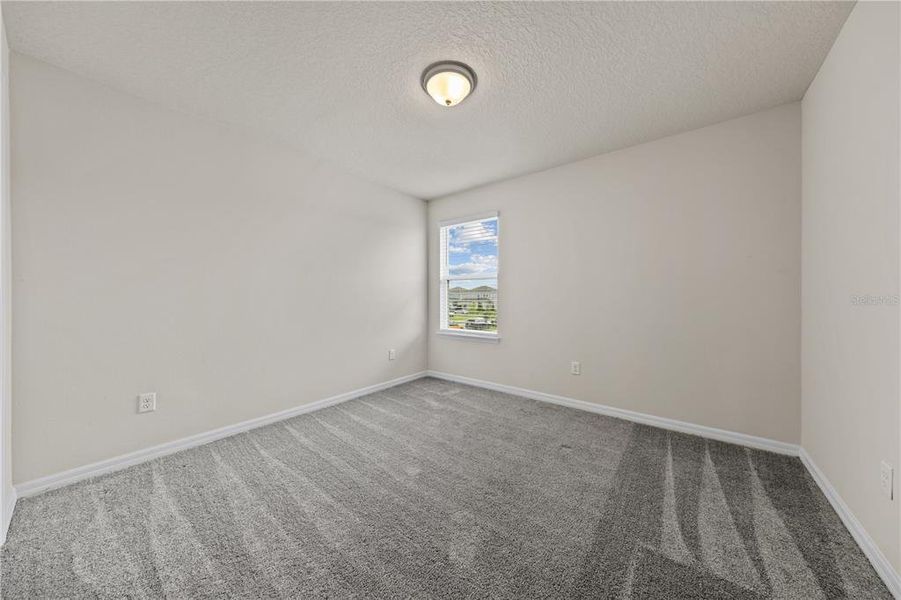 Spacious, unfurnished interior of a new home in EverBe, Orlando (Image 14).