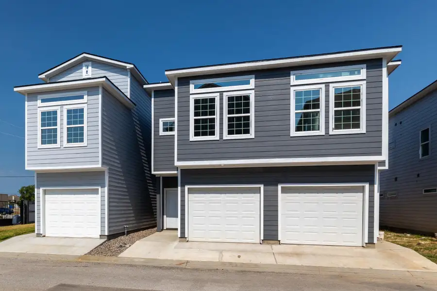 Front exterior of a new home in , Spring, TX, highlighting curb appeal (Image 1). Front exterior of a new home in , Spring, TX, highlighting curb appeal (Image 1).
