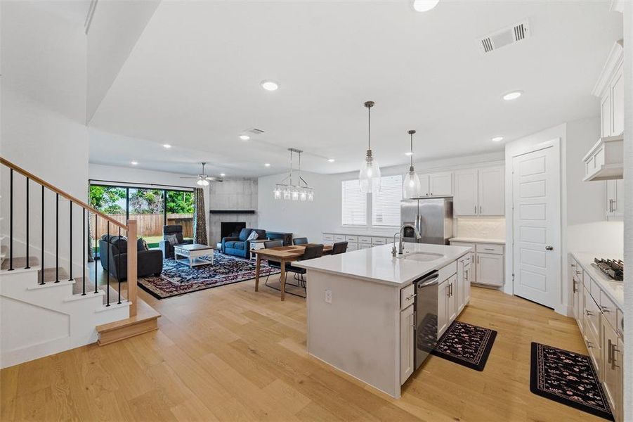 Large open concept kitchen, dining and living area