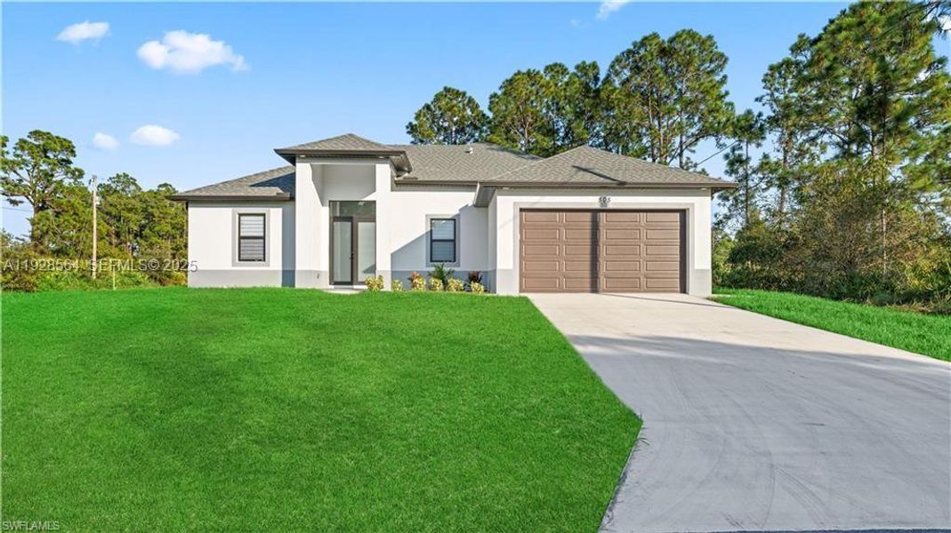 Front exterior of a new home in , Lehigh Acres, FL, highlighting curb appeal (Image 27).